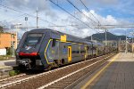 A Hitachi "Rock" EMU departs Sestri Levante for points South 